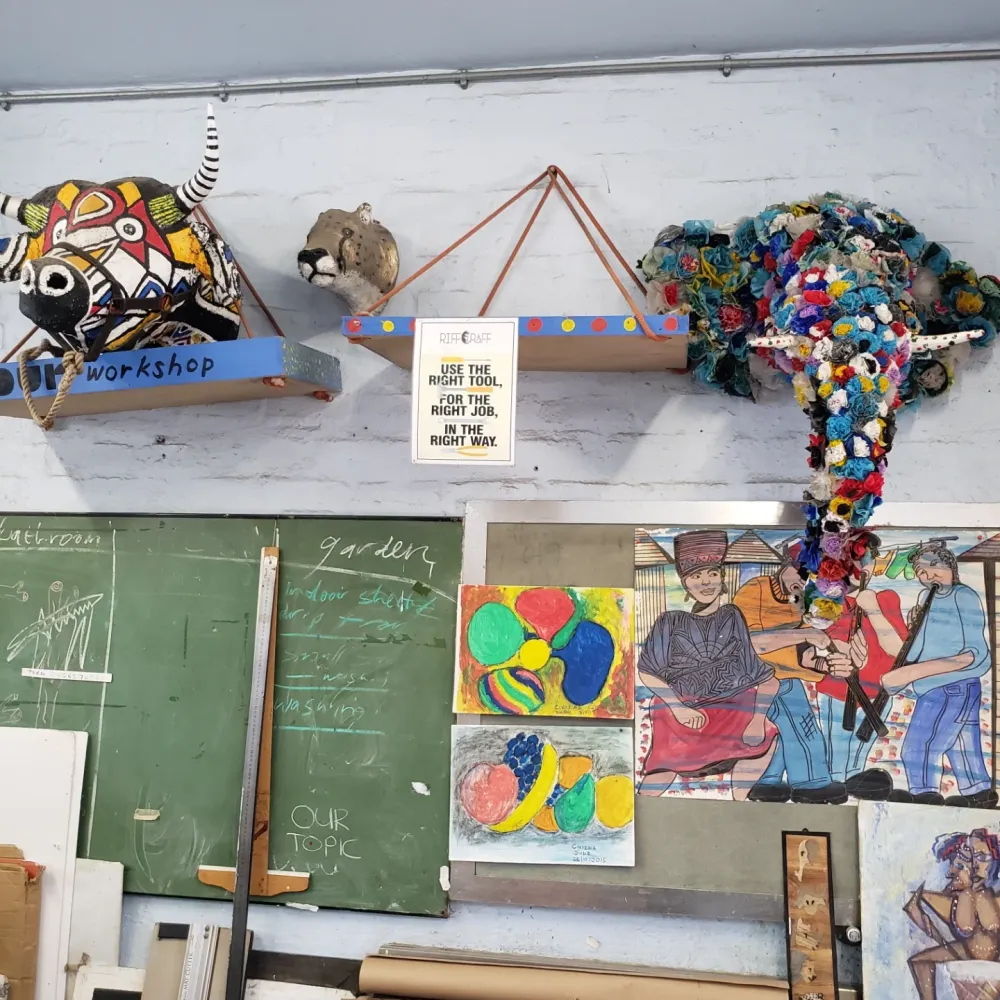 Sculptures and a noticeboard in the art workshop